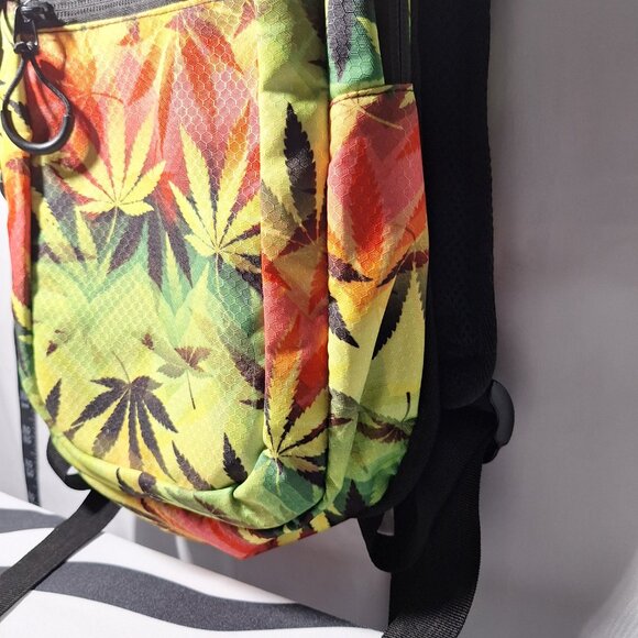Vibedration Hydration Backpack w/o bladder - green, orange, black leaves… - Picture 16 of 16